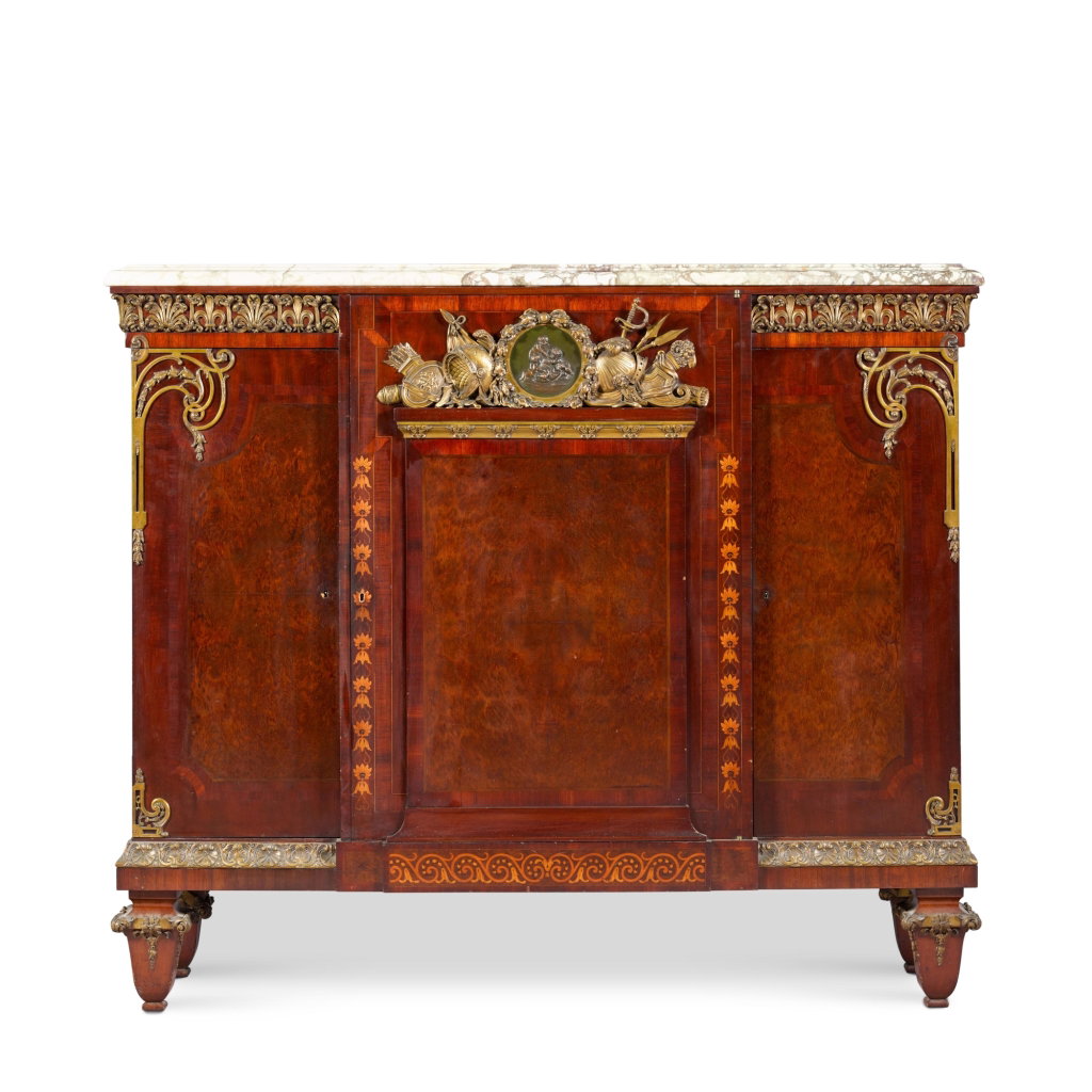 A French gilt-bronze mounted mahogany and burr cabinet, late 19th century by Attributed To Francois Linke sold for $7,823. Image courtesy of Sotheby's