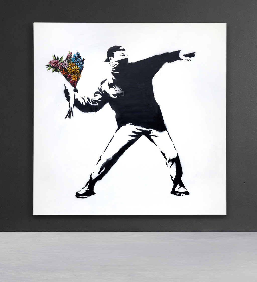 Love Is In The Air (life size) by Banksy sold for $8.52m. Image courtesy of Sotheby's