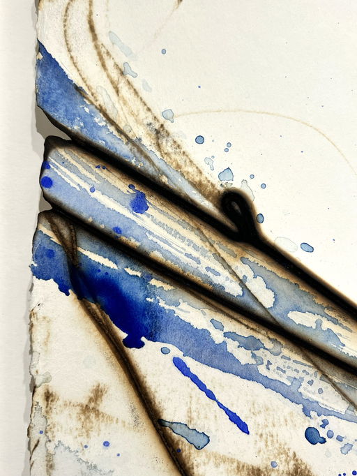 Etsuko Ichikawa exhibits stunning blue and brown works created by dropping molten glass on paper
