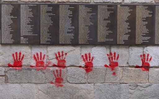 Three Bulgarians go on trial for painting red hands at Paris Holocaust Memorial