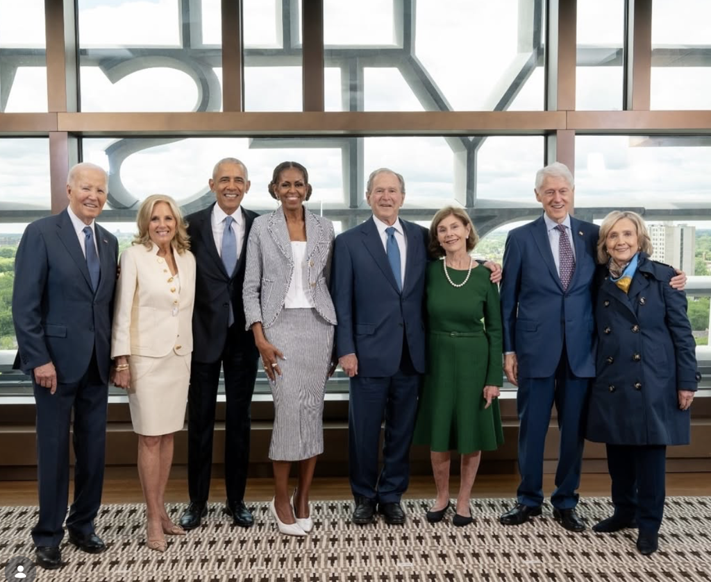 Former US Presidents and First Ladies pose in front of Idris Khan's monumental text work at the top of the Obama Center. Image courtesy of the Obama Center Instagram.