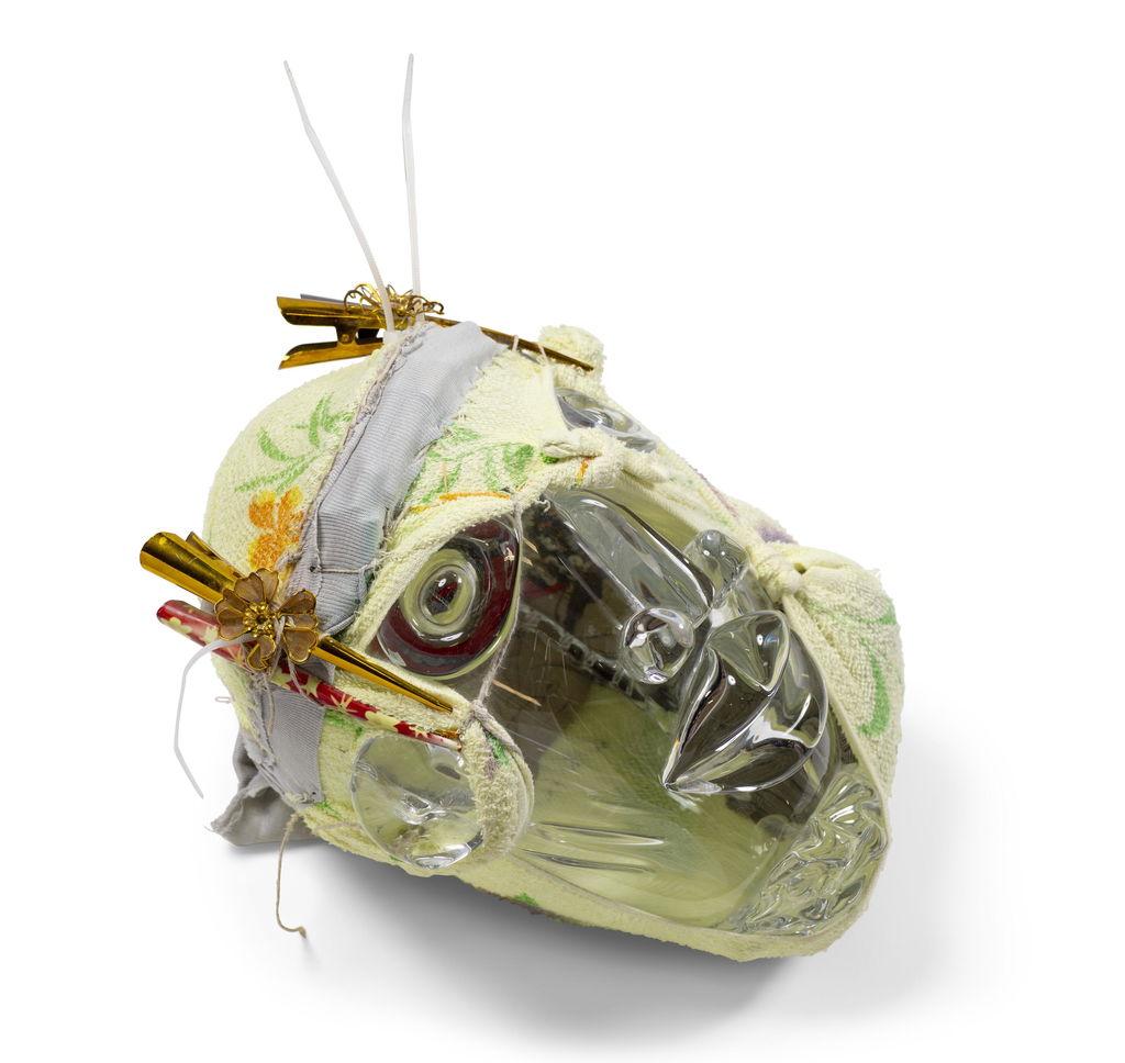 Untitled (Italian Masks) by Pascale Marthine Tayou sold for $29,000 (1342% above estimate). Image courtesy of Christie's