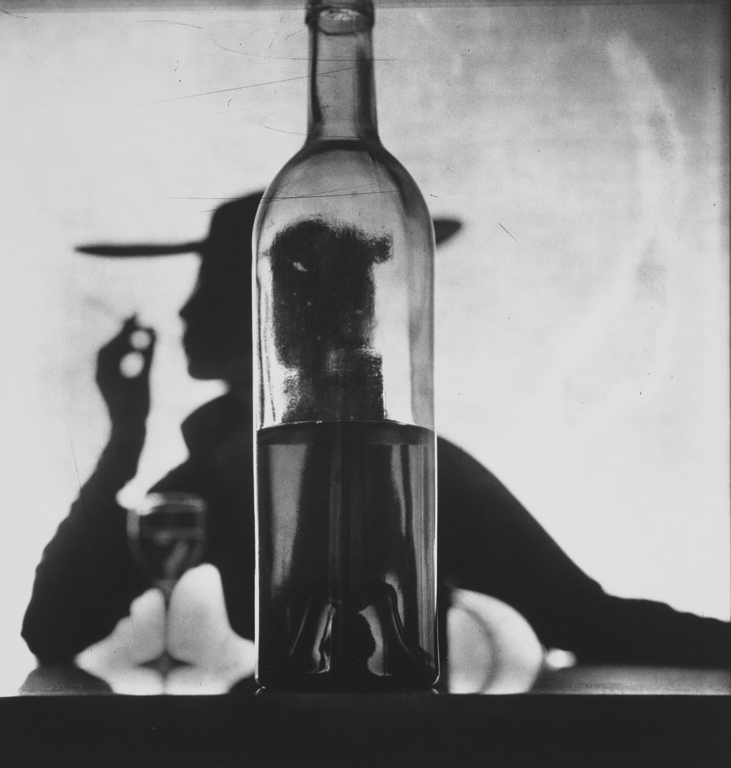 Girl Behind Bottle Jean Patchett, New York by Irving Penn sold for $190,500. Image courtesy of Christie's
