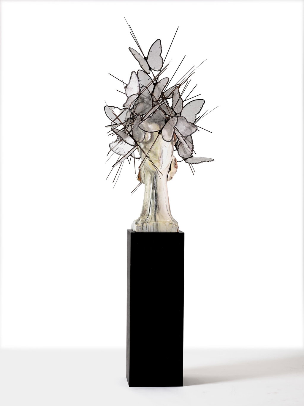 Cabeza Madera Blanca con Mariposas Transparentes by Manolo Valdes sold for $454,100. Image courtesy of Artcurial