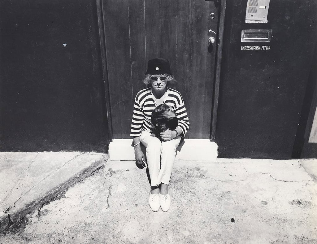 Whiteley with pet terrier at his Raper Street studio, 1988, photo © Jon Lewis