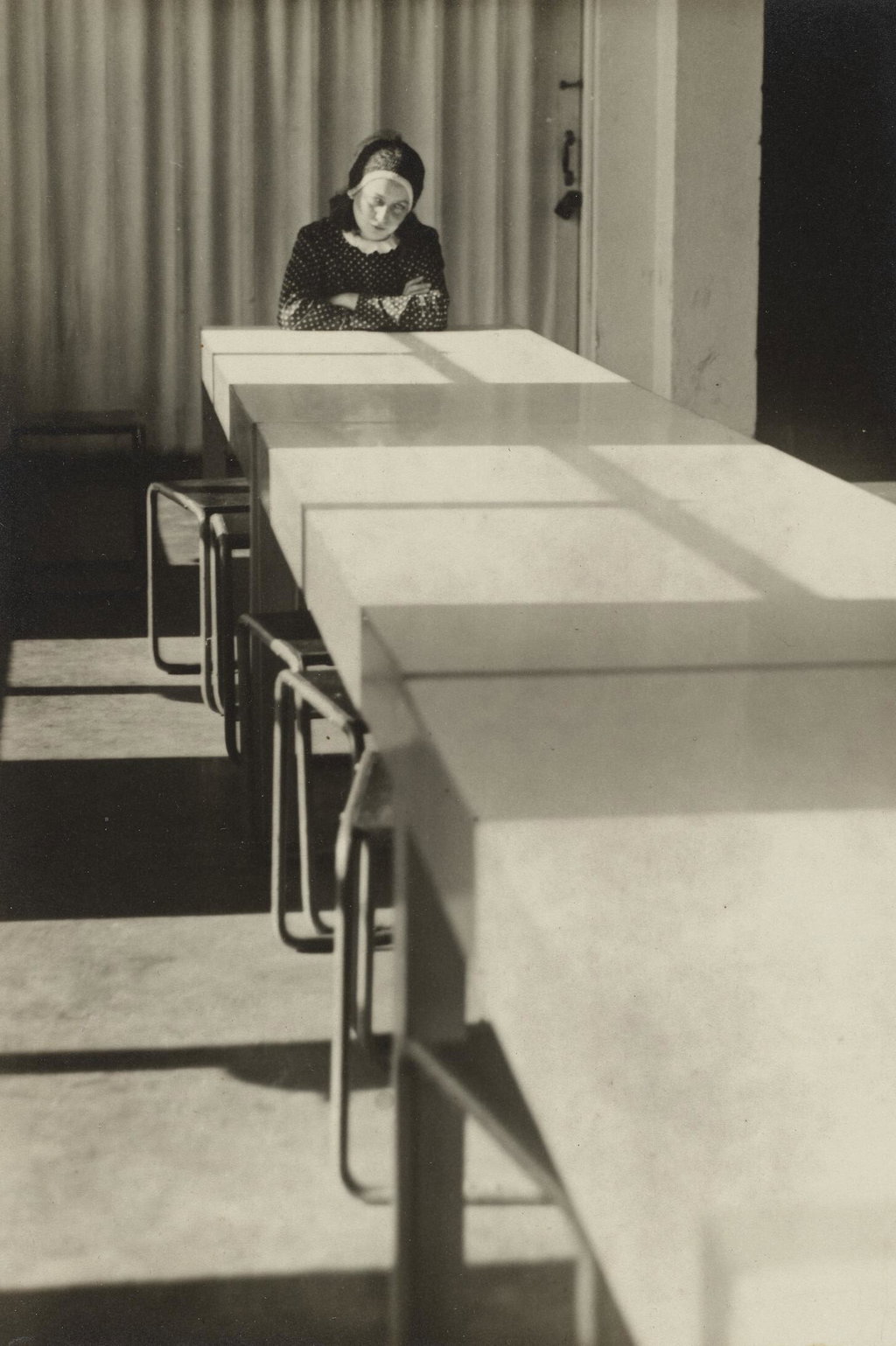Otti Berger in the empty canteen on the last day before the Bauhaus shutdown in Dessau, Germany, 1932 by Gertrud Arndt sold for $17,900. Image courtesy of Christie's