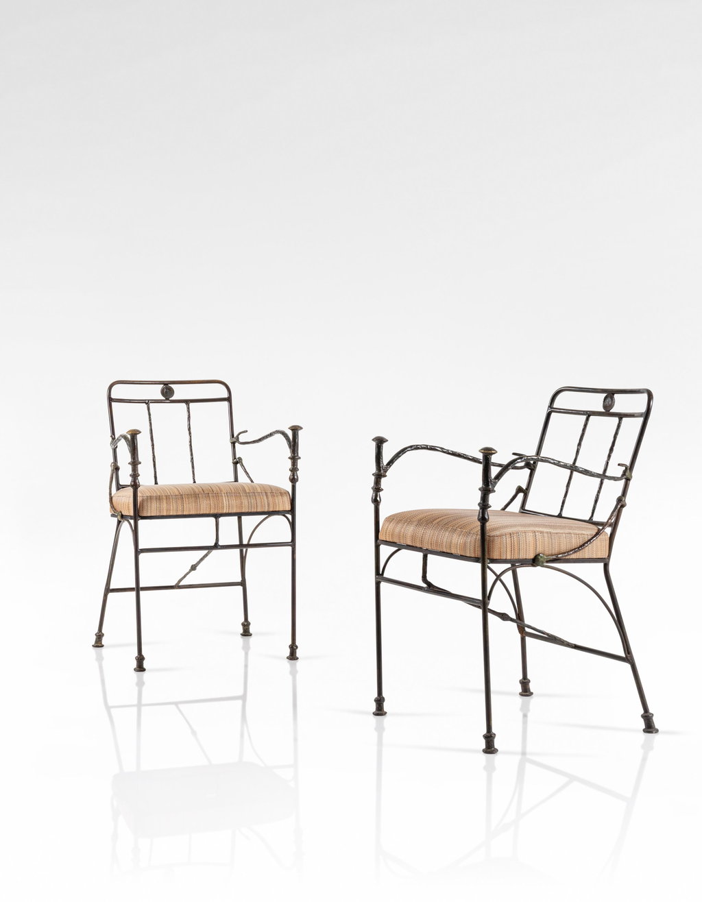 Pair of Pommeaux de Canne armchairs, special commission by Diego Giacometti estimated at $579,900 (low) to $811,800 (high). Image courtesy of Sotheby's