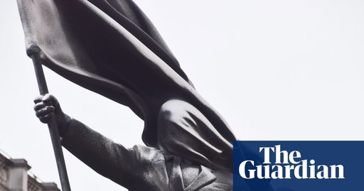 Banksy confirms statue of man blinded by flag in London is his work