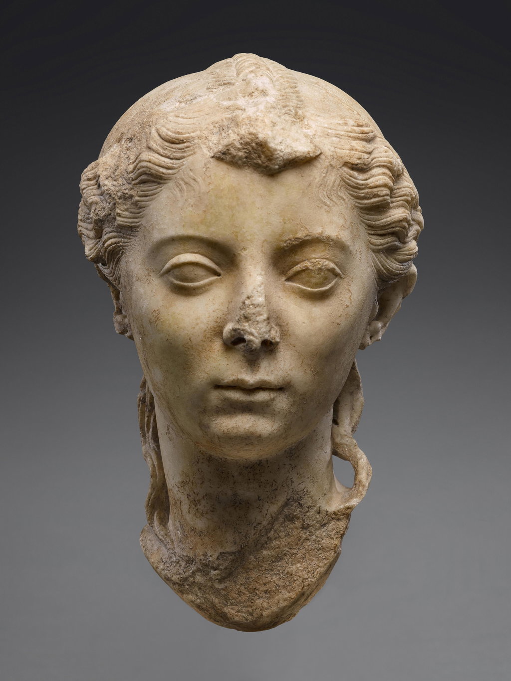 A Marble Portrait Head of a Girl by Roman Imperial Period estimated at $2.5m (low) to $3.5m (high). Image courtesy of Sotheby's