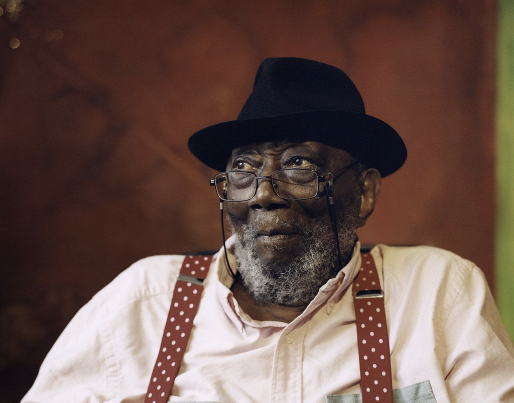 Portrait of Frank Bowling at his studio in Peacock Yard, 2025. Photograph by William Waterworth, Courtesy Frank Bowling Archive