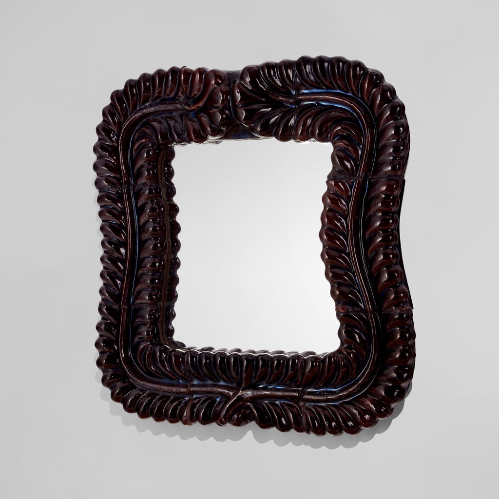 Large mirror by Georges Jouve sold for $245,100. Image courtesy of Phillips