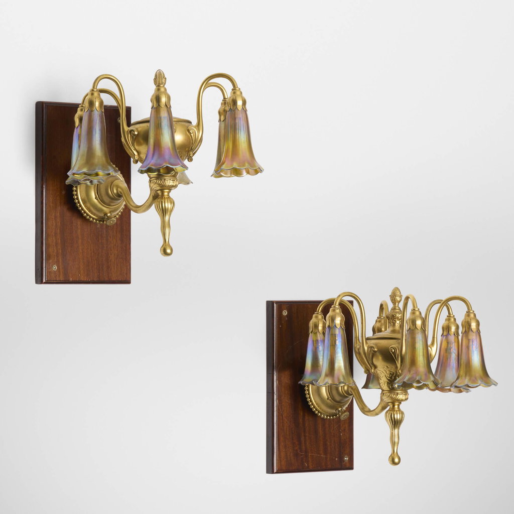 Six-light Lily sconces, pair by Tiffany Studios sold for $33,300. Image courtesy of Rago Arts & Auction Center