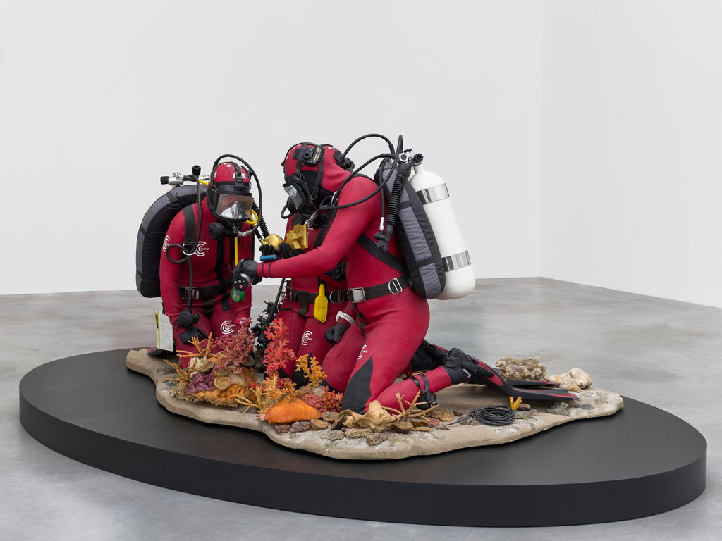 Three Divers Discovering Gold Objects 2