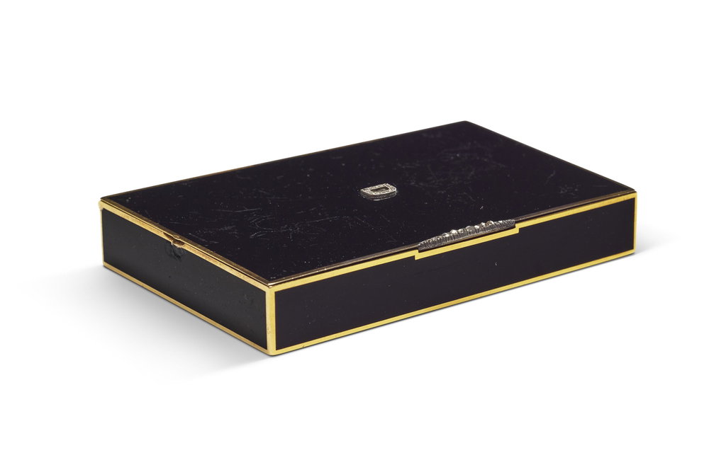 CARTIER GOLD, BLACK ENAMEL AND DIAMOND CIGARETTE CASE by Cartier sold for $17,500 (1814% above estimate). Image courtesy of Christie's