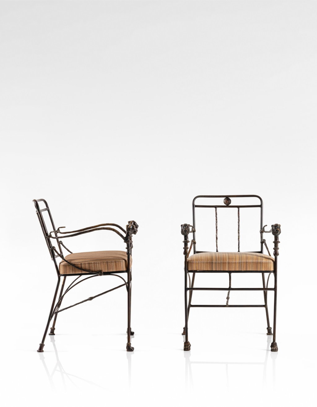Pair of Têtes de Lionnes, second version armchairs, special commission (1975) by Diego Giacometti estimated at $579,900 (low) to $811,800 (high). Image courtesy of Sotheby's